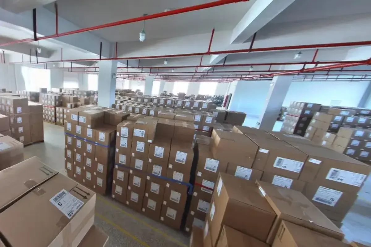 Packed cartons organized in a warehouse for order allocation