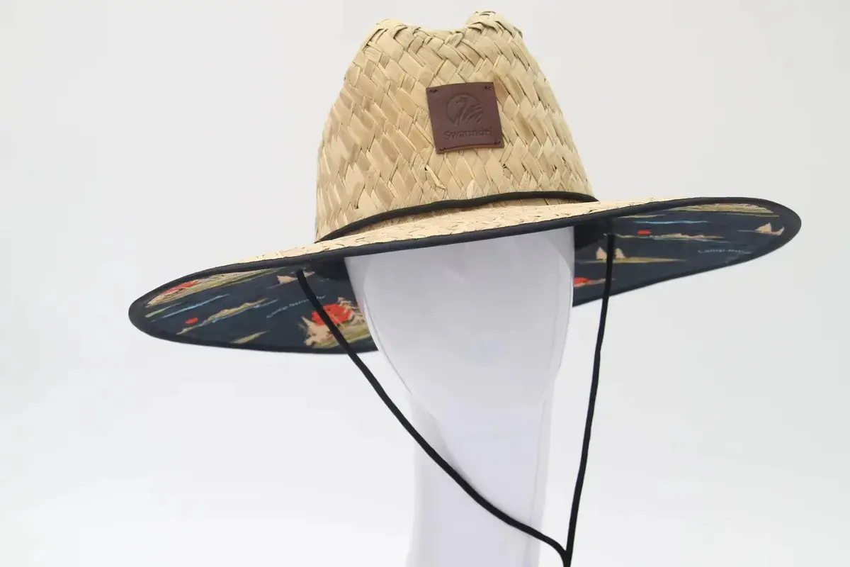 Natural lifeguard straw hat with a colorful printed under-brim and chin cord