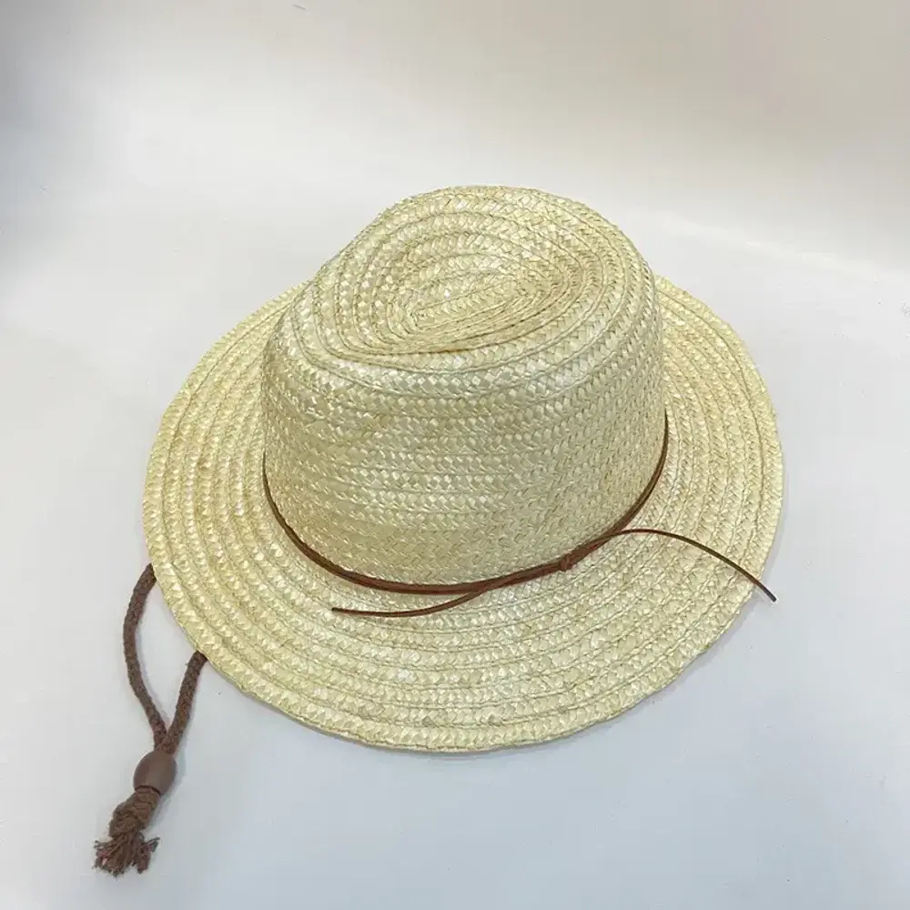 Natural wheat-straw Panama-style fedora with a cord band