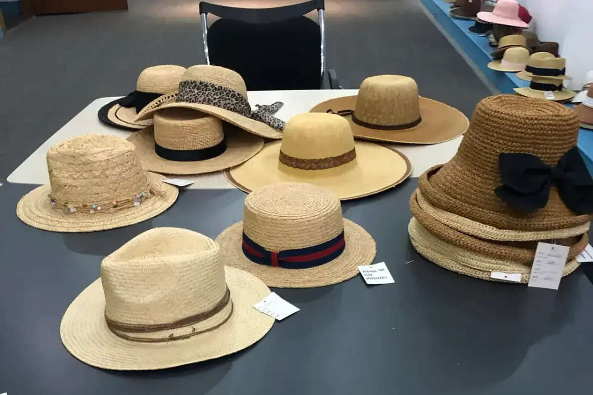 Panama-style straw hat samples arranged for profile selection