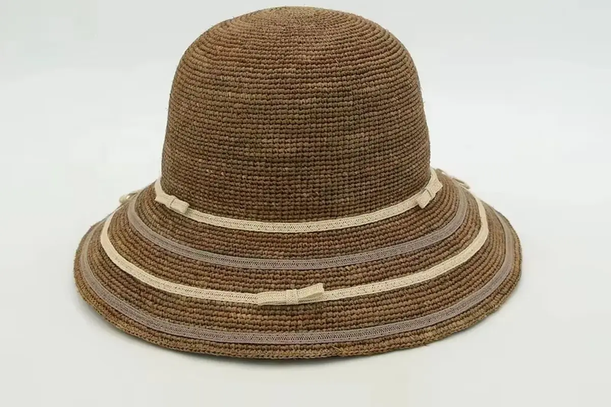 Raffia bucket hat with layered contrast bands around the brim