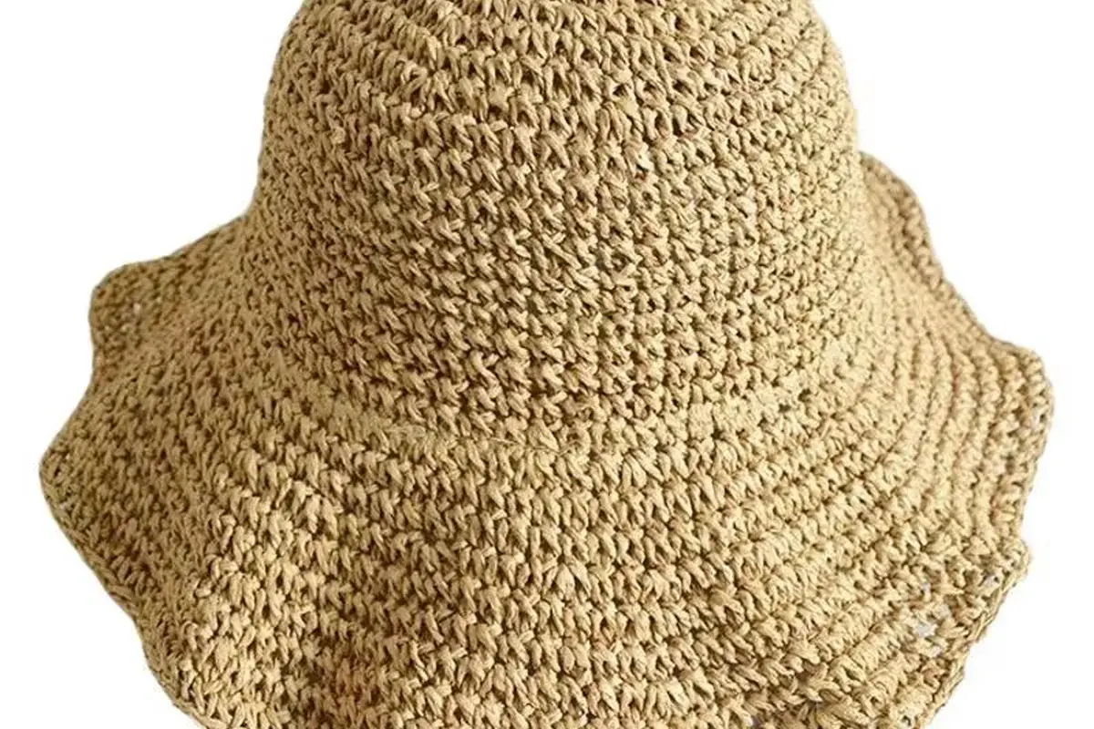 Natural crochet bucket hat showing a deep crown and soft brim structure