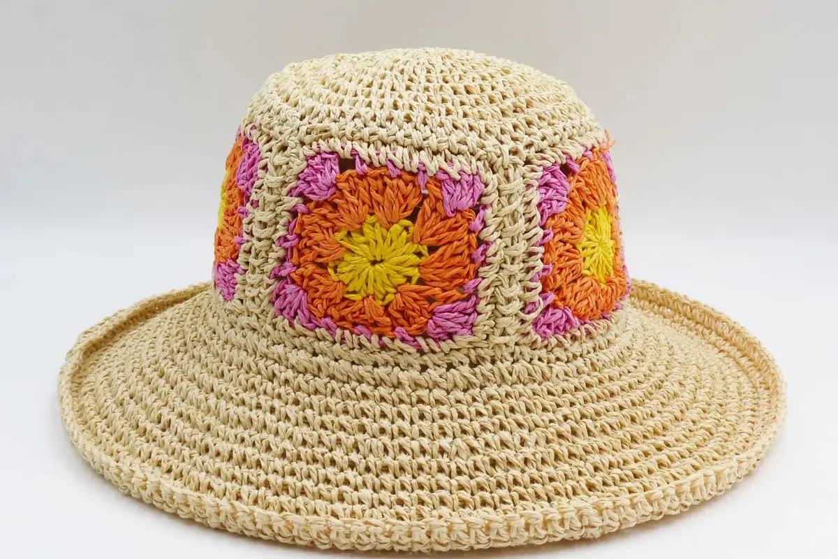 Crochet straw bucket hat with colorful decorative patch panels
