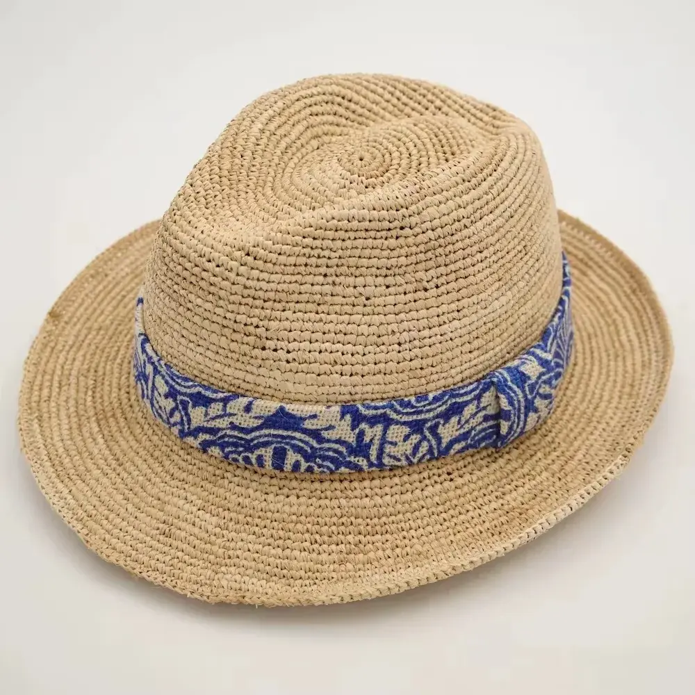 Natural raffia fedora with a blue patterned band