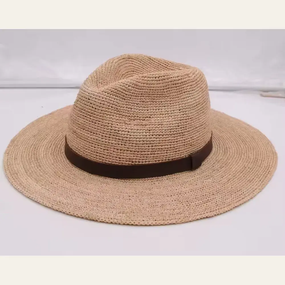 Soft pink-brown raffia fedora with a slim leather band
