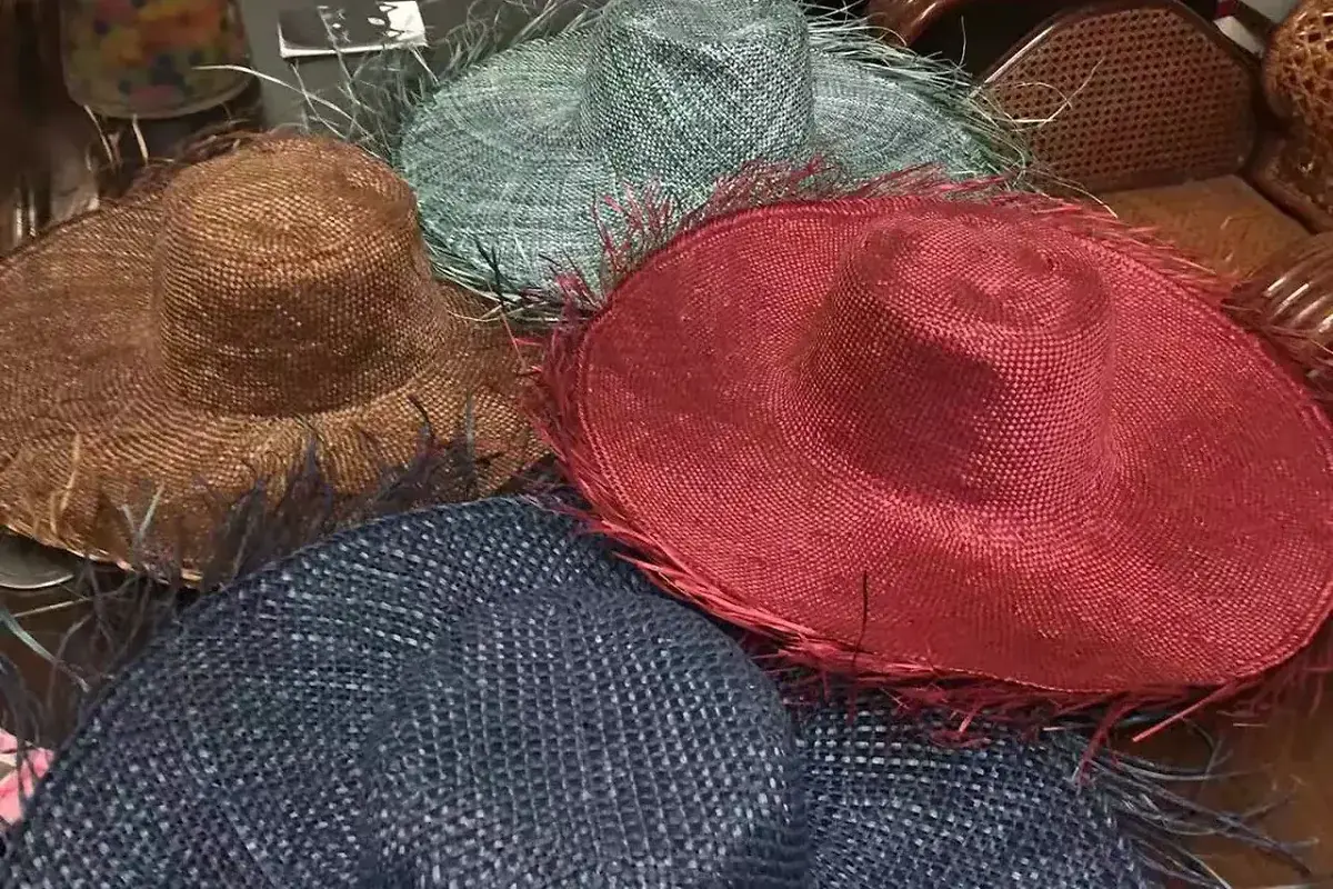 Blue, red, brown, and green dyed straw hat bodies before finishing