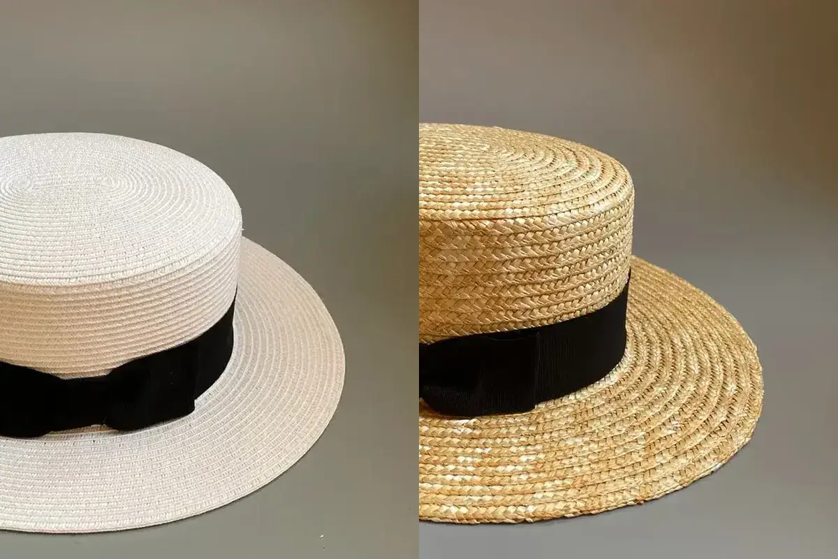 Two boater hats showing ribbon bands positioned at the crown and brim junction