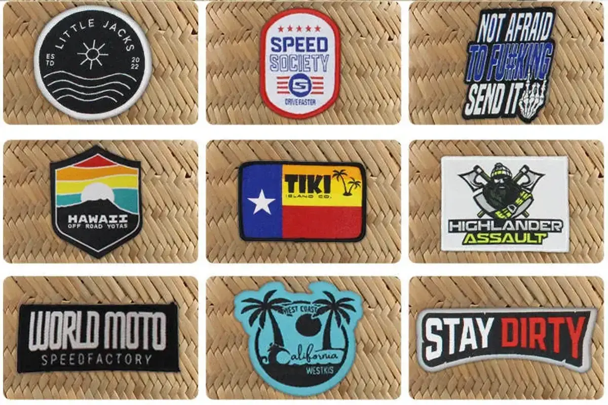 Nine embroidered patch samples showing different shapes, borders, and stitch details