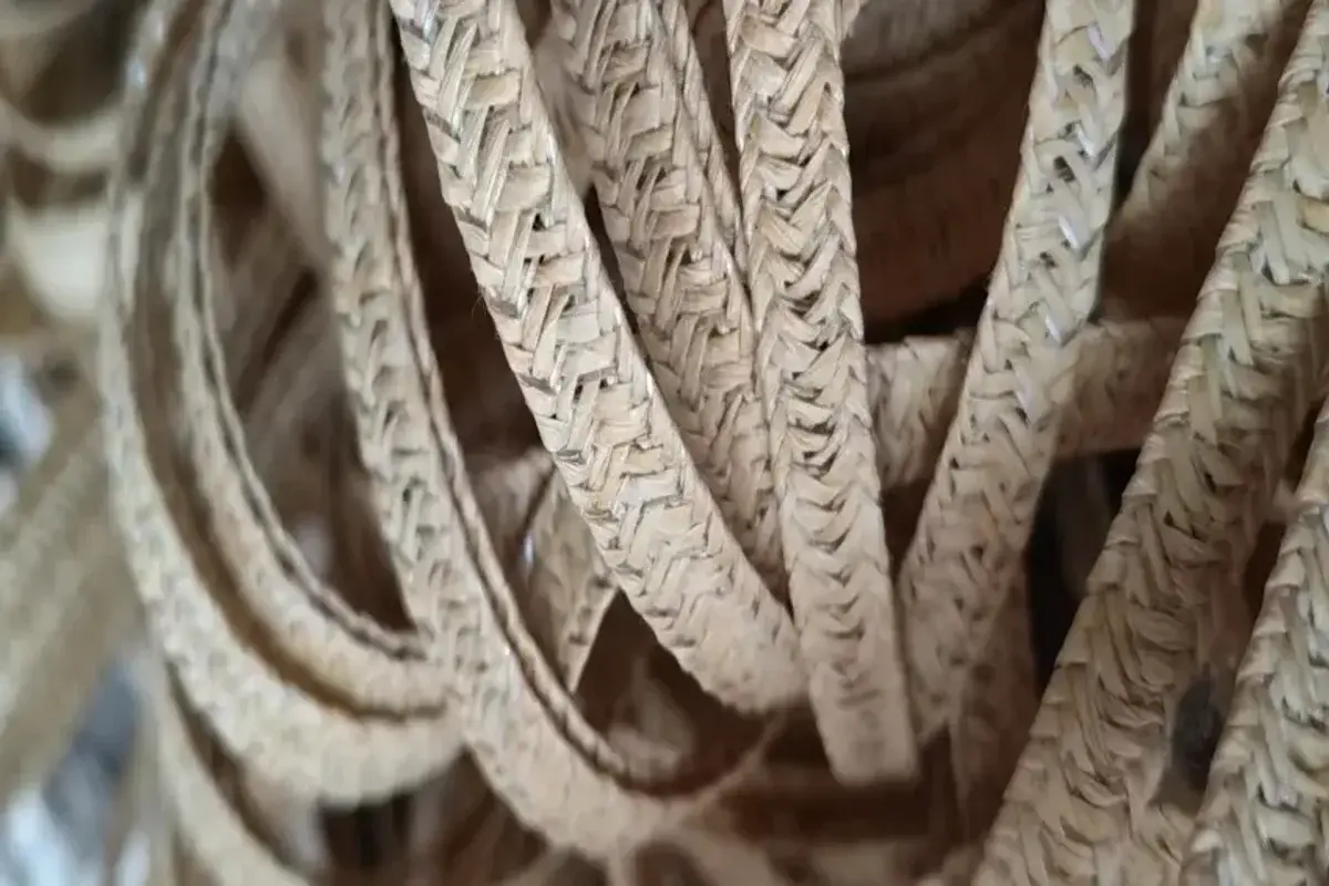 Close-up bundles of woven straw braid for material identification