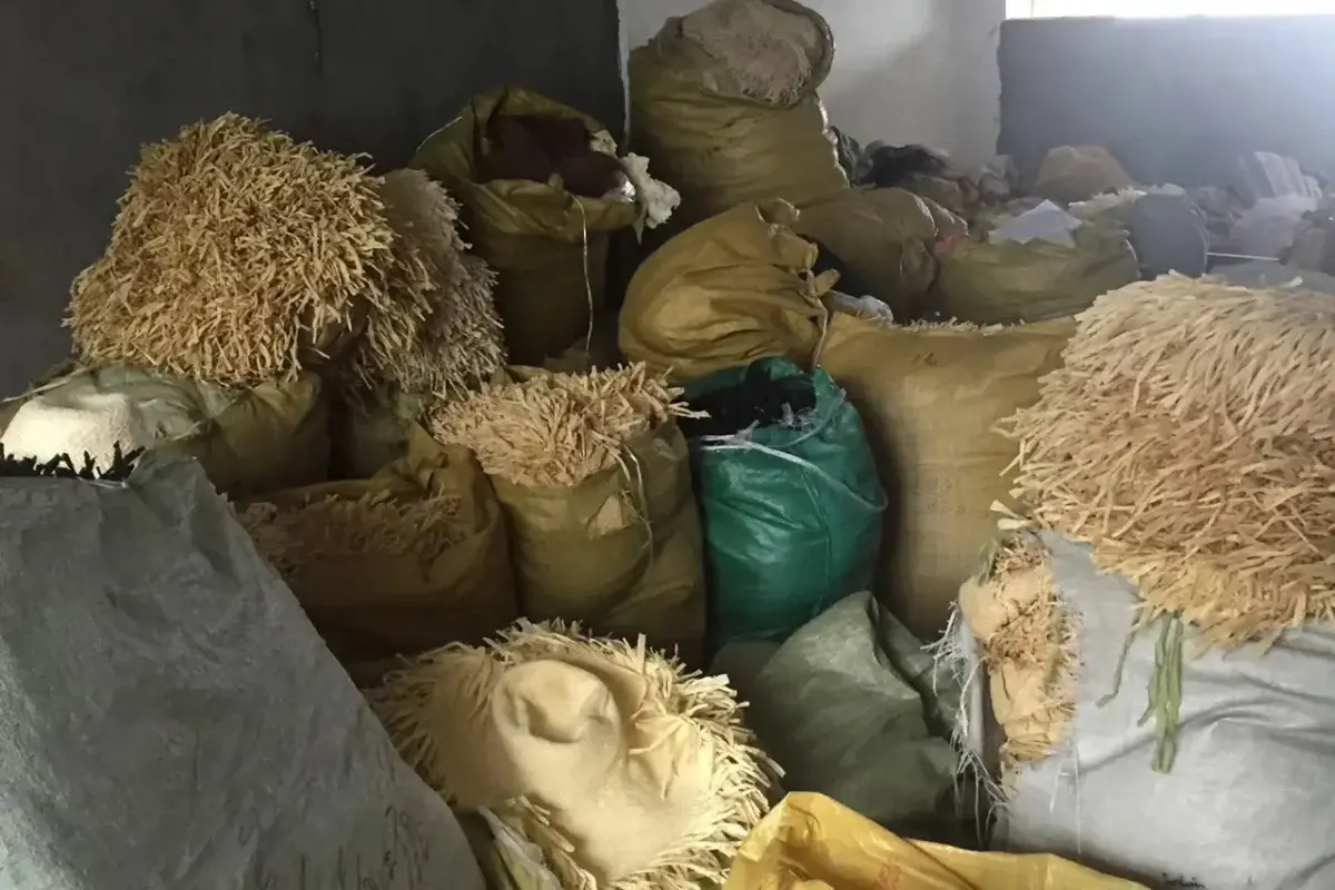 Separated bags of straw cutting remnants prepared for measurement and handling