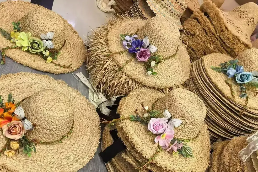 Decorated straw hats prepared for resort gift or event programs
